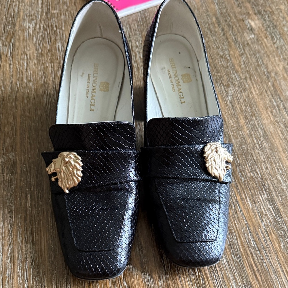 Bruno Magli Black Textured Loafers with Gold Lion Accent